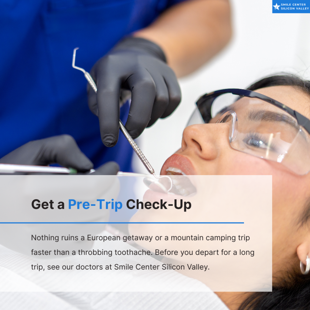 A patient wearing protective eyewear receives a dental examination from a dentist wearing black gloves at Smile Center Silicon Valley in Sunnyvale.