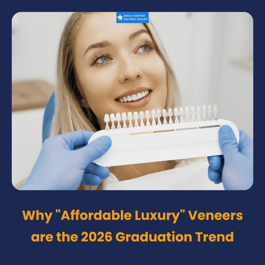 A close-up of a happy 2026 graduate in a cap and gown, showing off a natural-looking, bright smile with ultra-thin porcelain veneers.