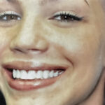 Portrait of a smiling young woman showing off a radiant, brilliantly white smile following a teeth whitening session in Sunnyvale.